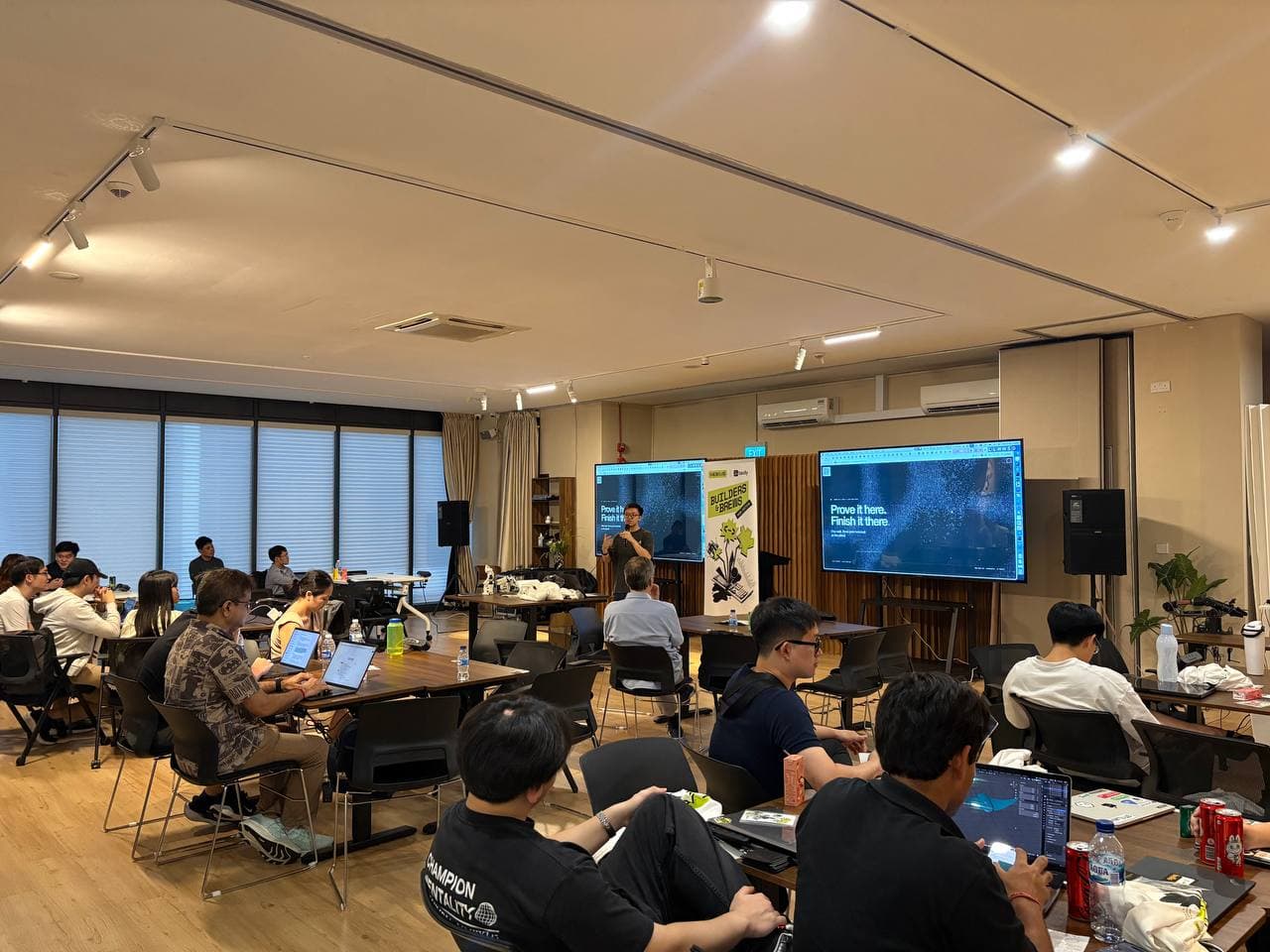 Kairos presenting a live Devin software engineering demo to the Builders & Brews audience