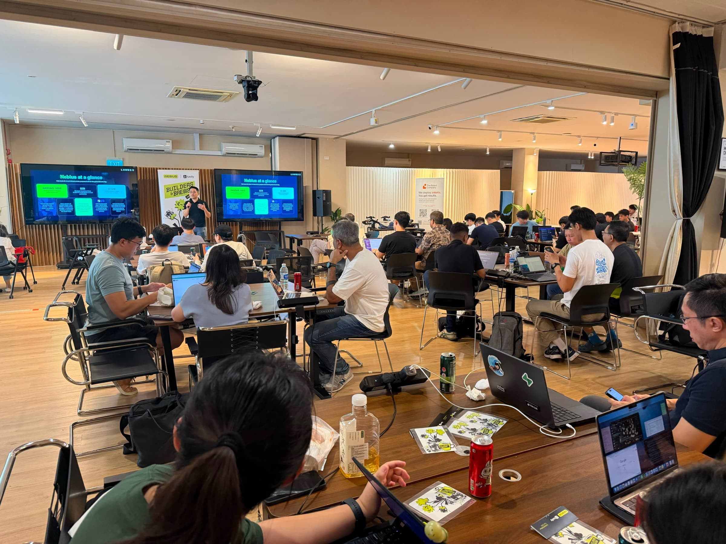 A full room of builders during the Nebius presentation at Builders & Brews Singapore